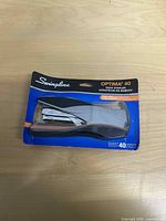 Front view of sealed Swingline Optima 40 stapler package