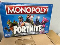 Front of sealed Monopoly Fortnite board game box