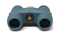 Binoculars front view showing teal rubber body, yellow focus wheel, eyepiece caps