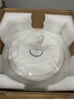 Fan housing inside original foam-lined box