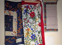 All three scarves hanging for full view