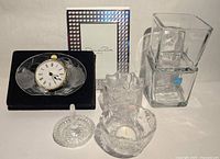 All eight crystal/glass items displayed together