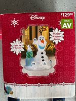 Front of retail box displaying Disney Olaf & Snowgies inflatable with price tag and features