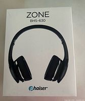 Front of retail box showing Phaiser Zone BHS-630 headphones
