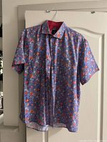 Front view of Modango Milano short-sleeve floral dress shirt