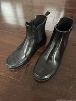 Pair of black Hunter Chelsea boots front/side view