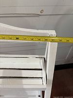 Tape shows 21.5 in shelf width on top rail