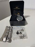 Overall lot with Tavan watch in box, three bracelets, bagged cufflinks and studs