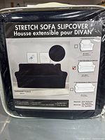 Front of sealed package showing product name, color, size ticked for two-seater