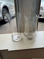 Both glass vases side by side showing relative sizes