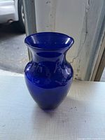 Front view of cobalt blue glass vase