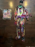 Complete costume pieces laid out on floor