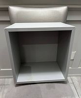 Front view showing open interior and finish