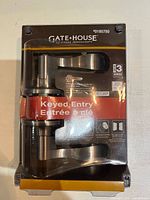 Front view of sealed Gatehouse keyed entry lever set in package