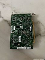 Back view of Nvidia Quadro NVS 300 PCB with part labels