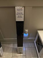 Front view of boxed Summer Retractable Walk-Thru Gate