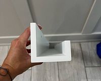 end view showing L-profile and white finish