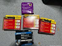 Group shot of all six retail-packaged insulation and weatherstrip kits on floor