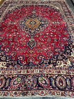 Full view of entire rug showing design and borders