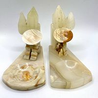 Front view of both onyx bookend ashtrays showing stone coloration and design