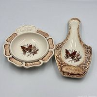 front view of both Treasure Craft pieces showing butterfly designs