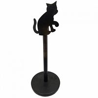 Full view of metal candlestick holder showing cat silhouette and base