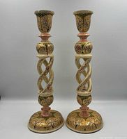 Front view of both candleholders showing full design and height