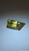 Front angled view of rectangular lemon citrine showing step facets