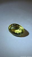 Top view of oval lemon citrine loose gemstone