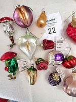 Group view of nine glass ornaments