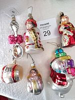 All six glass ornaments arranged on surface