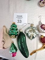 Group shot of all seven glass ornaments
