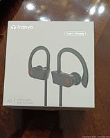 Front of Tranya X2 retail box showing earbuds and Type-C charging specification