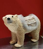 Adult polar bear figurine profile left