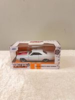 Front left view of boxed 1970 Plymouth Road Runner die-cast model