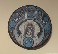 Front view of painted drum showing full artwork