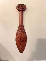 Full view of carved paddle front profile