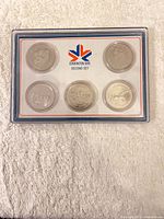 Full view of case showing five medallions