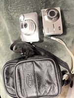 Front view of both cameras and case