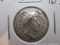 Obverse side showing laureate bust and legend