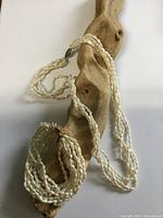 Necklace and bracelet full view draped to show strands