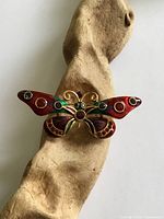 Front view of Joan Rivers enamel butterfly brooch