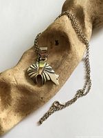 Front view of bear pendant on chain