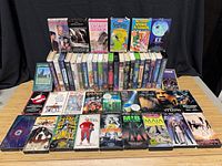 Full lot of VHS tapes arranged on table