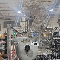 Full view of Breuer blower with torn wire mesh guard