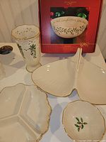 Group view of boxed bowl, vase, fan tray, divided dish, candy dish