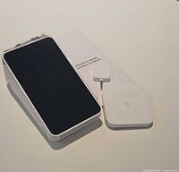 Square Terminal device, dock and reader on tabletop