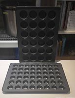 Both pans upright showing cup count and finish