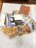 Overview of lot with flower press, stamps, cards, stickers, scissors