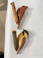 Overall view of both bird carvings